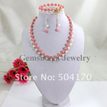 Набор из розового коралла и жемчуга (ожерелье, серьги, браслет)
Resource id #30