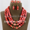 Набор из коралла (ожерелье, серьги, браслет)
