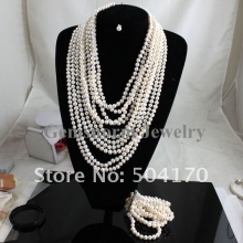 Набор из речного жемчуга (ожерелье, серьги, браслет)
Resource id #31